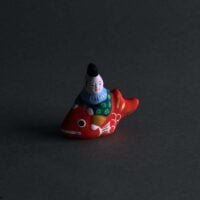 Toyama clay doll, CHILD RIDING a RED-SNAPPER